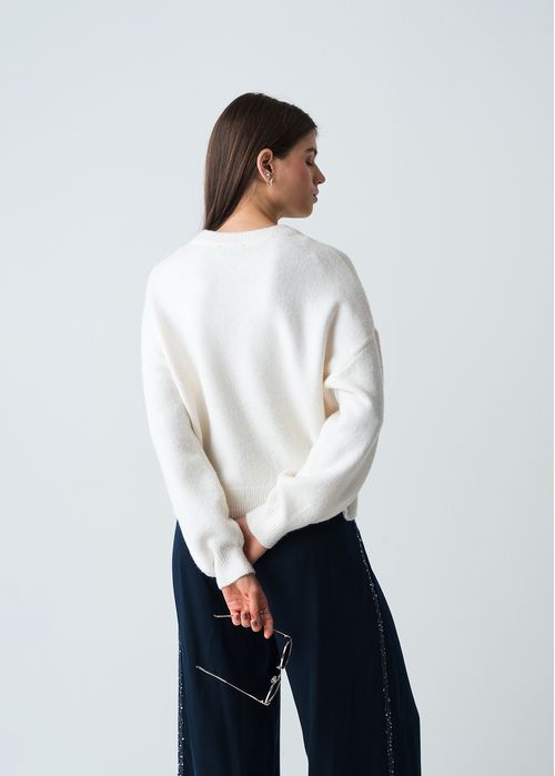 Buzo tejido con apliques